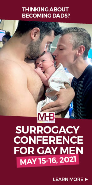 Ad showing two gay men with their newborn baby