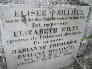The grave reads: Eliseé Rilliéux, Elizabeth Wiltz, Marianne Frederick, Evilina Rilliéux